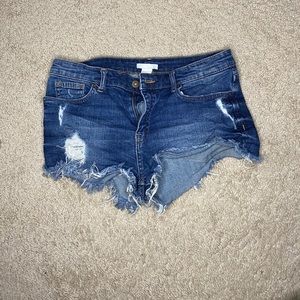 Distressed cutoff denim shorts